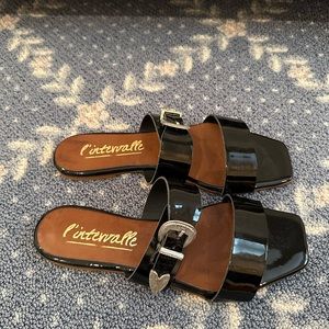 Black patent flats with western detailing